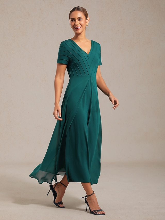  Combinaison femme vert foncé col V design à panneaux imitation deux pièces fluide aspect transparent tissu extensible destination mariage invité printemps été automne