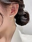 preiswerte Ohrringe-1 Paar Ohrstecker Tropfen-Ohrringe For Damen Partyabend Geschenk Verabredung Aleación Schick Mode Diamant Stern