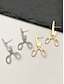 billiga Kvinnors örhänge-knäppa saxformade örhängen - trendiga fashion statement-smycken för kvinnor - roliga och edgy accessoarer