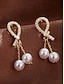 baratos Brinco Feminino-Brincos de pérolas artificiais femininas com design em forma de lágrima e strass, elegante estilo dourado pendurado, adequados para deslocamento diário, escritório, casamento, festa e noite