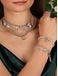 abordables Collier pour femme-Ensemble de bijoux de Noël pour femmes avec collier et bracelet superposés - style festif argenté avec flocon de neige, cloche et breloques cadeaux pour les fêtes et les célébrations de Noël