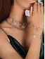 abordables Collier pour femme-Ensemble de bijoux de Noël pour femmes avec collier et bracelet superposés - style festif argenté avec flocon de neige, cloche et breloques cadeaux pour les fêtes et les célébrations de Noël