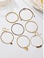 economico Bracciale da donna-set di braccialetti a strati con perline bohémien da donna: braccialetti multifilo in oro e marrone con accenti a forma di cuore e ciondolo, gioielli alla moda per feste, festival e uso quotidiano