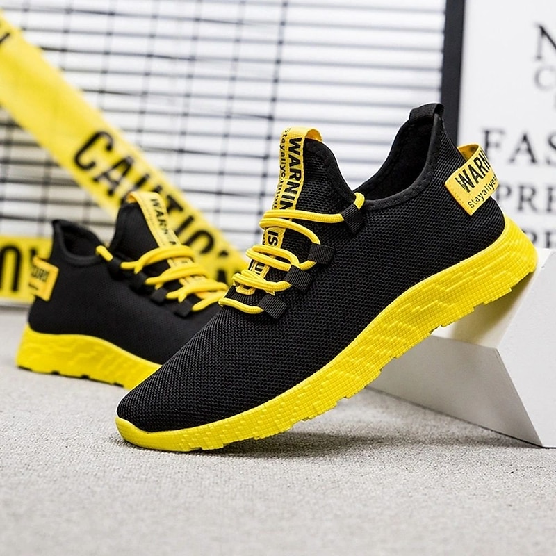 Black and Yellow Men's Athletic Sneakers with Breathable Mesh and Lightweight Design for Sports and Casual Wear