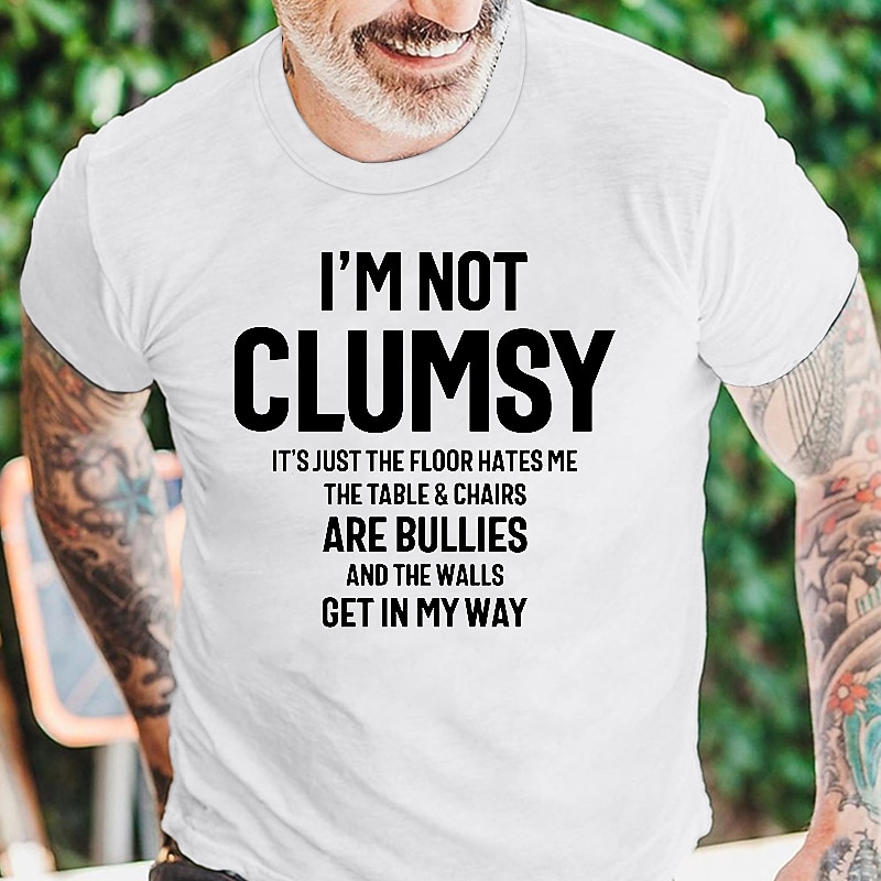 Men's Funny 'I'm Not Clumsy' Graphic T-Shirt - Humorous Short Sleeve Tee with Floor Hates Me & Bullying Chairs Quote