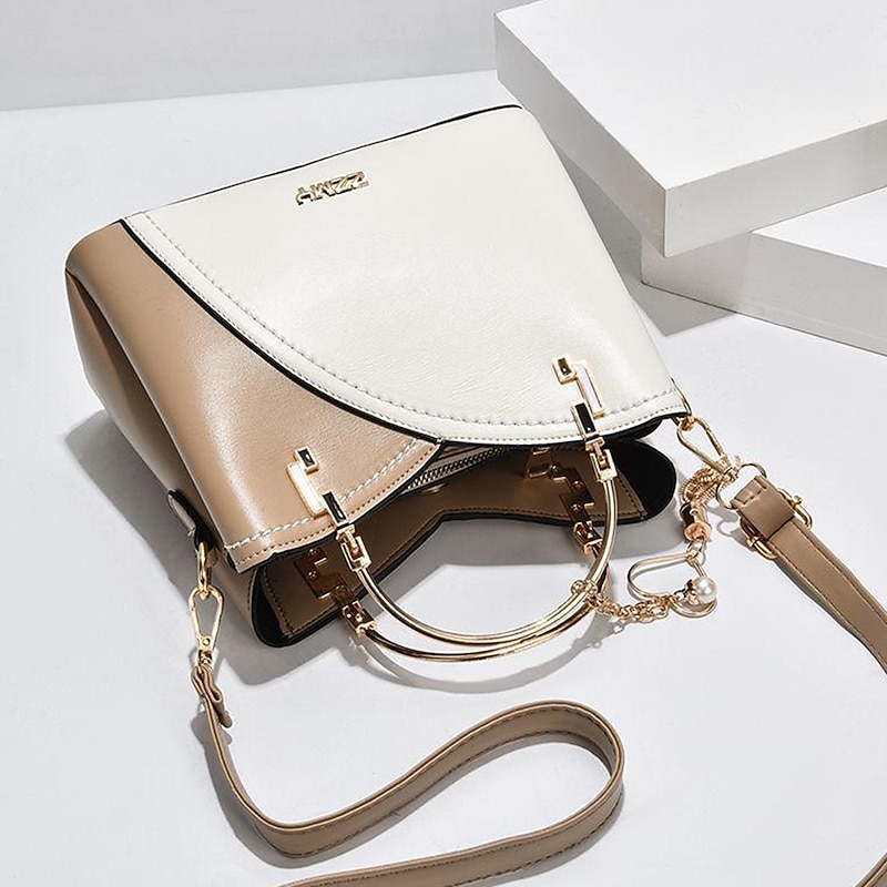 Women's Navy Blue and Pink Handbag with Heart Tassel Charm – Elegant Faux Leather Crossbody and Tote Bag for Everyday Use4