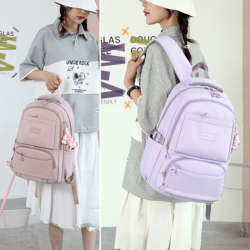 Girls' Large Capacity School Backpack with Luggage Strap and Cartoon Keychain – Lightweight Waterproof Travel Bag for Teen Students or Daily Commute2