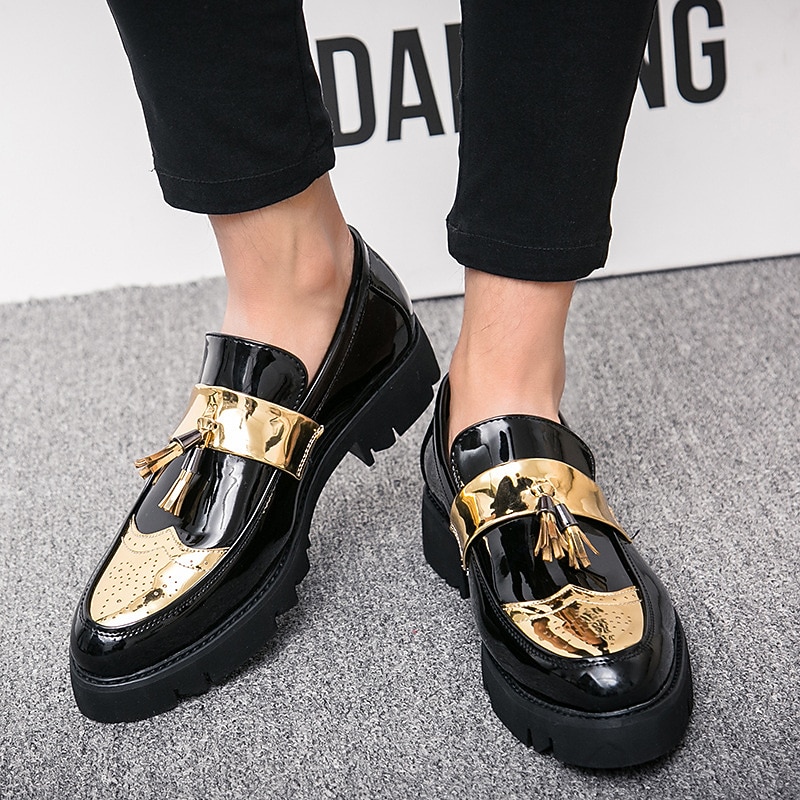 Men's Black and Gold Patent Leather Loafers with Tassel Details and Rugged Sole for Formal and Casual Occasions