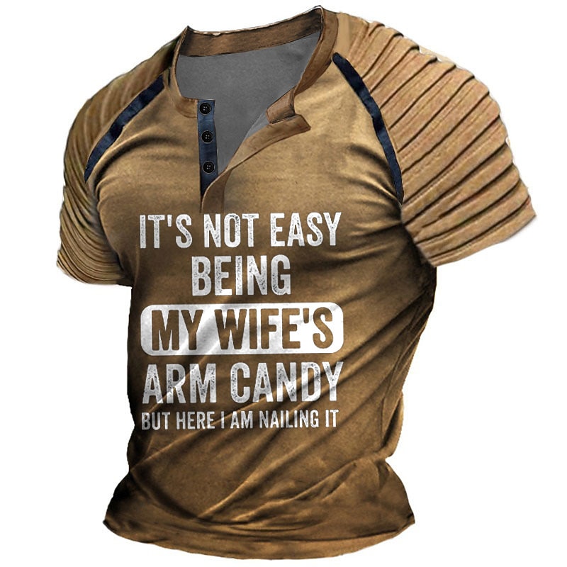 Men's Funny Graphic T-Shirt: 'It's Not Easy Being My Wife's Arm Candy But Here I Am Nailing It' - Short Sleeve Husband Humor Gift2