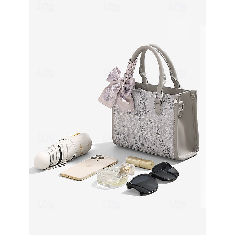 Women's Elegant Silver Floral Embossed Handbag with Oversized Bow | Versatile Crossbody Bag for Evening Events and Daily Use4
