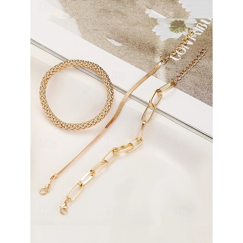 Trendy Women's Gold-Tone Bracelet Set – Chunky Chain, Sleek Snake Chain, and Textured Bangle for Elegant Layered Look4
