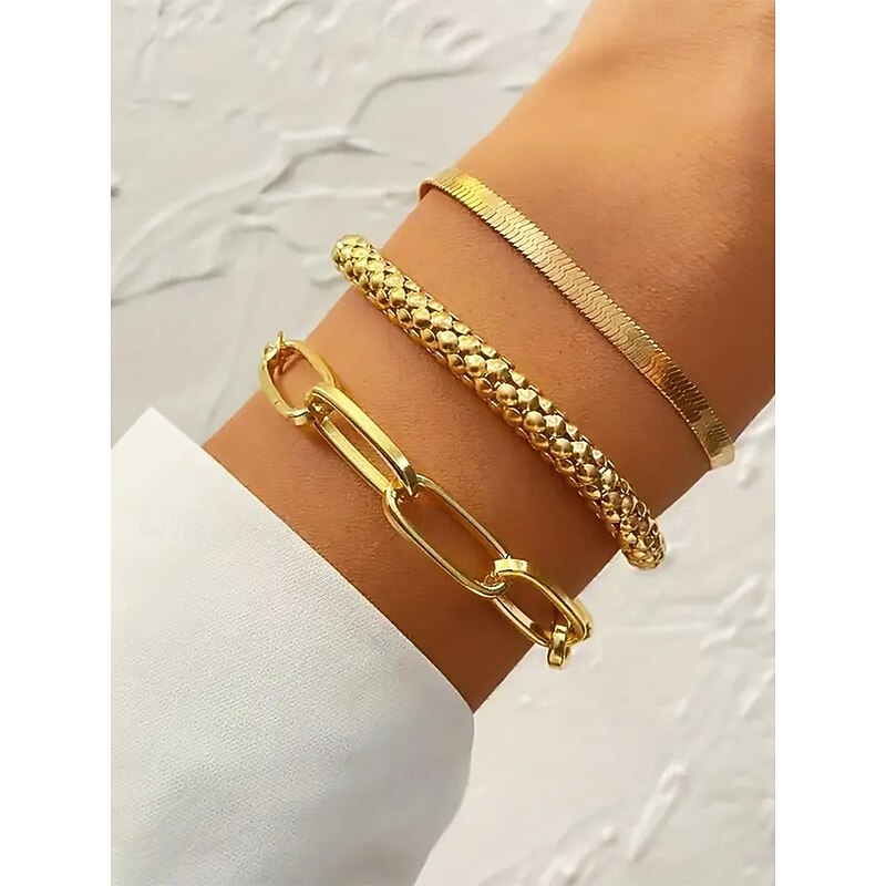 Trendy Women's Gold-Tone Bracelet Set – Chunky Chain, Sleek Snake Chain, and Textured Bangle for Elegant Layered Look2