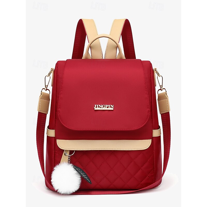 Women's Quilted Red Backpack with Pom Pom Charm – Stylish and Practical Bag with Adjustable Straps and Beige Accents3
