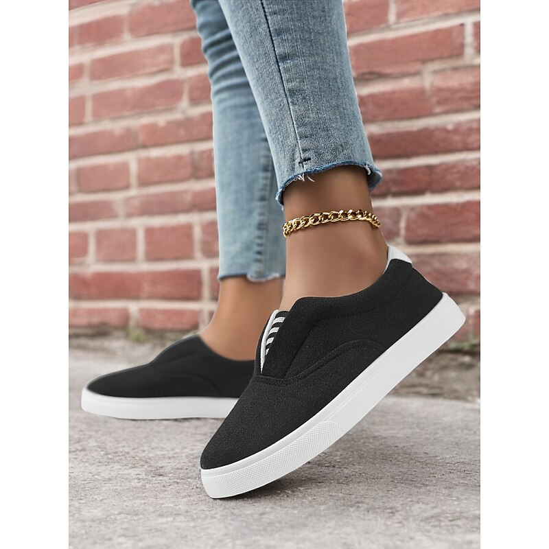 Women's Black / White Slip-On Canvas Sneakers – Casual and Comfortable Shoes for Everyday Wear4