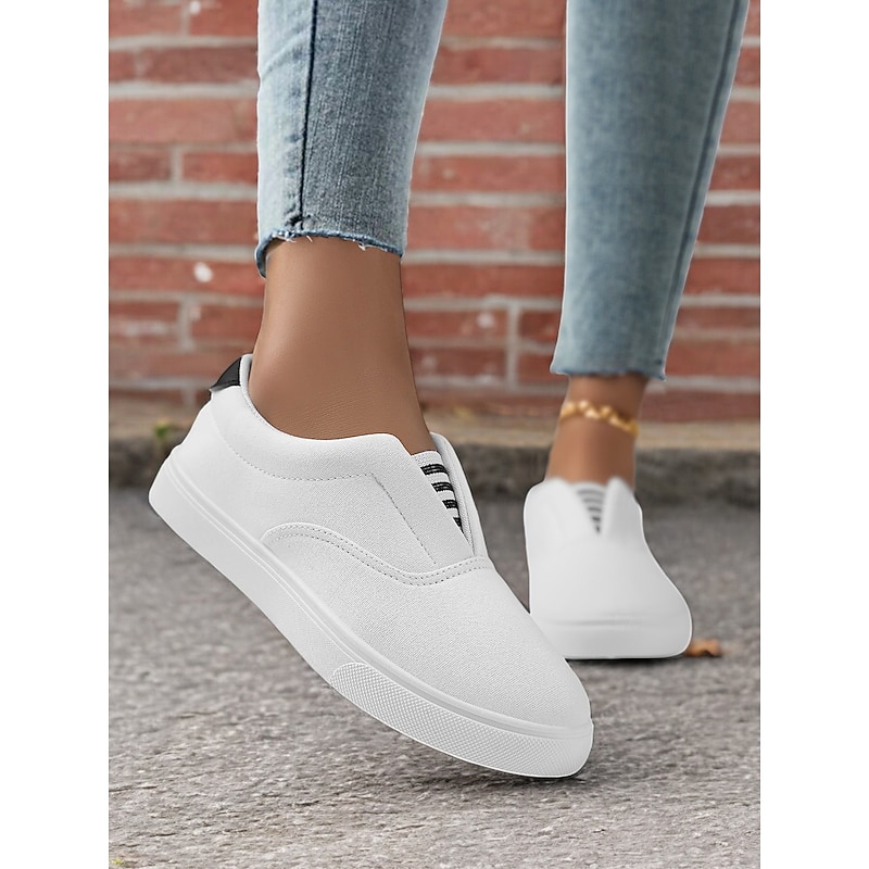 Women's Black / White Slip-On Canvas Sneakers – Casual and Comfortable Shoes for Everyday Wear3