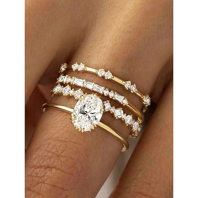 Gold Stacking Rings Set with Oval-Cut and Round Cubic Zirconia, Elegant Minimalist Jewelry for Women, Perfect for Weddings, Engagements, and Special Occasions