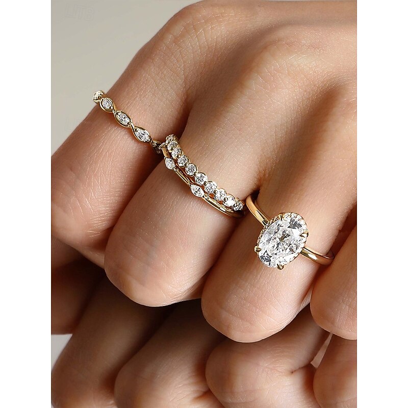 Gold Stacking Rings Set with Oval-Cut and Round Cubic Zirconia, Elegant Minimalist Jewelry for Women, Perfect for Weddings, Engagements, and Special Occasions3