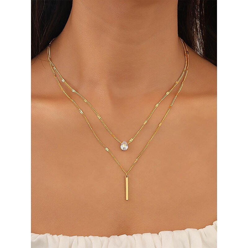 Women's exquisite water drop pendant double-layer gold tone necklace, elegant and simple style, suitable for fashion-conscious women to wear in casual and party occasions