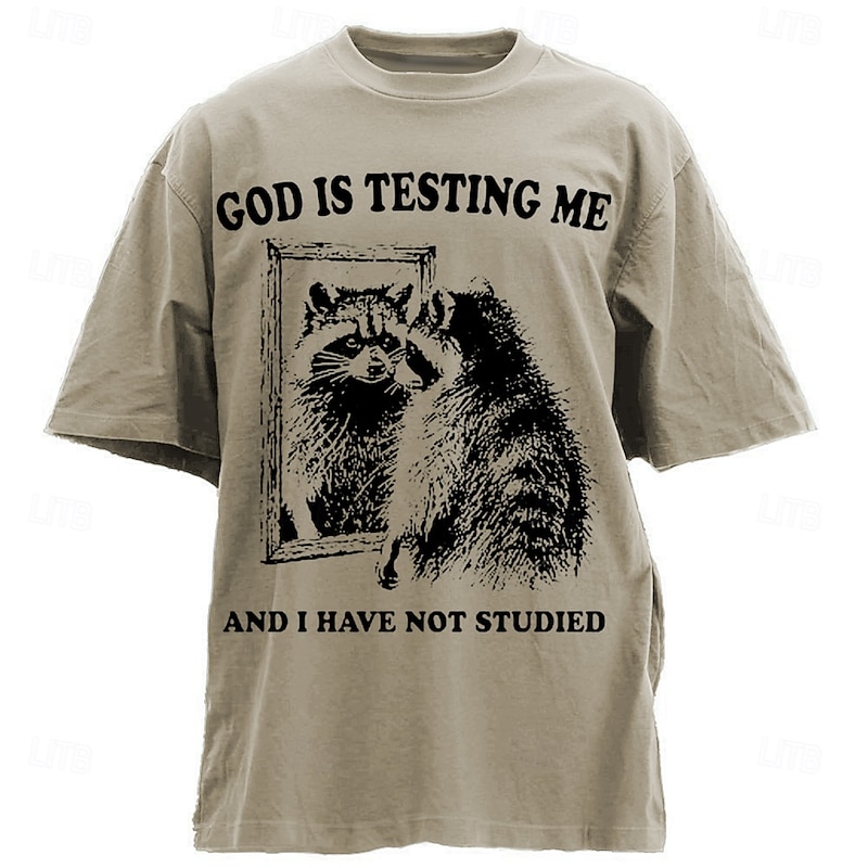 Men's Humorous Graphic T-Shirt: 'God Is Testing Me And I Have Not Studied' Raccoon Design Short Sleeve Lifestyle Tee