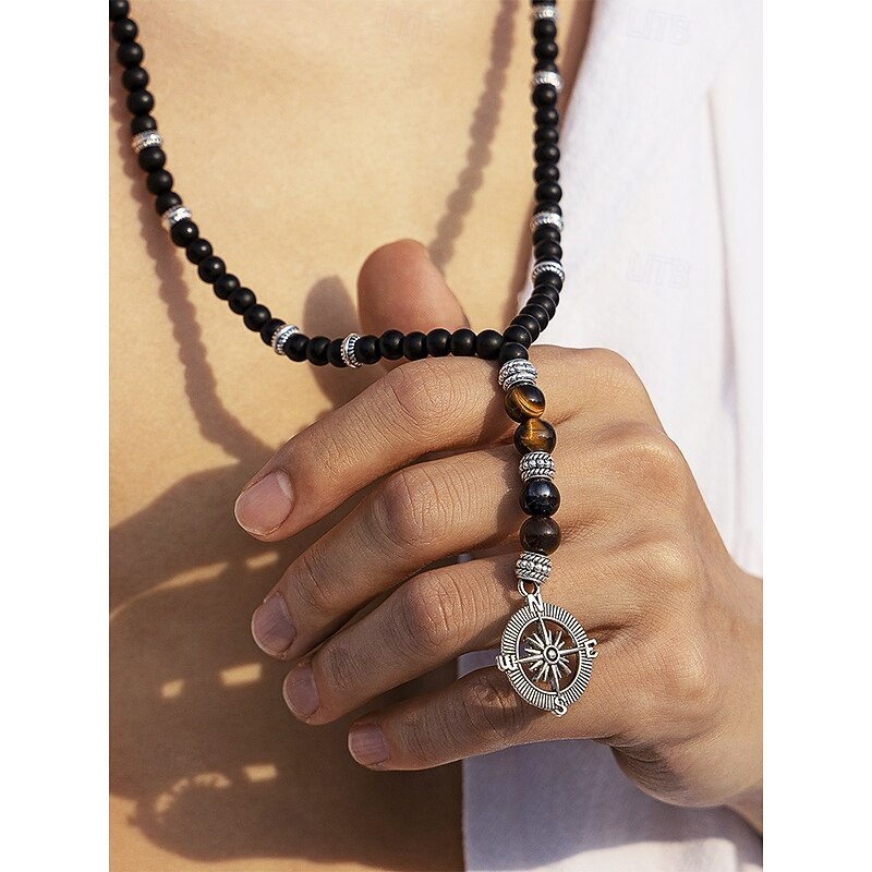 Men's Black Matte Bead Necklace with Silver Compass Pendant, Stylish Tribal-Inspired Design, Adjustable Length, Casual and Boho Style for Everyday Wear and Travel