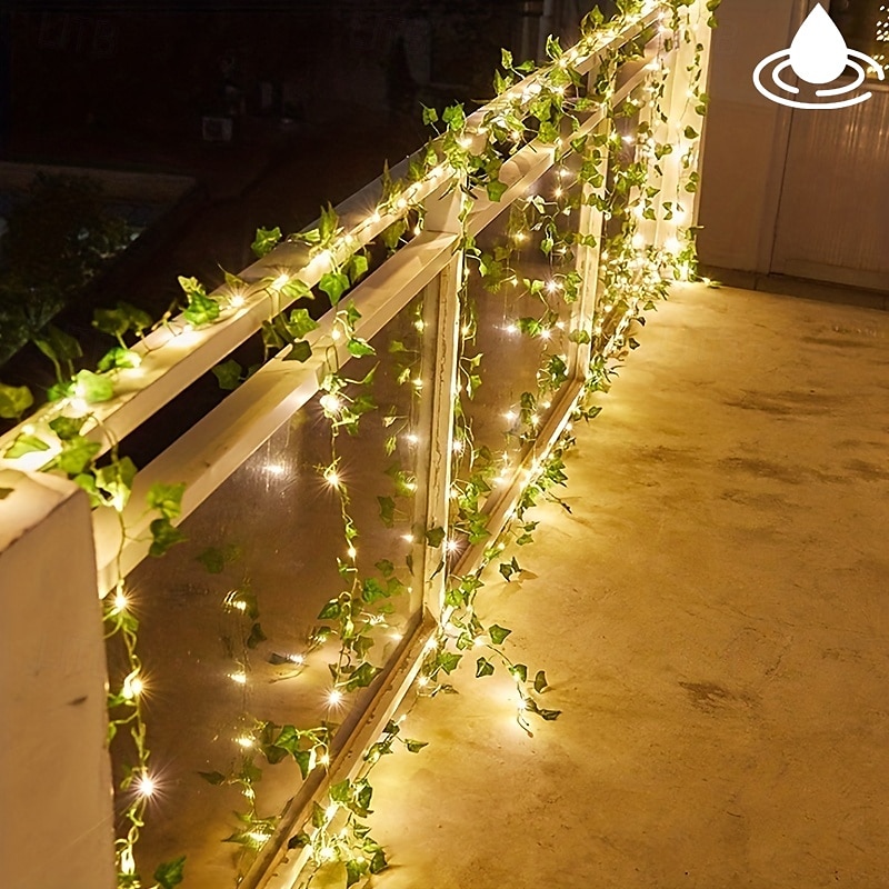 Solar Vine String Lights Ivy Lights LED Artificial Rattan Green Plant LED Solar String Light Outdoor Waterproof Led String Hanging Lights for Yard Fence Wall Hanging Wedding Decoration