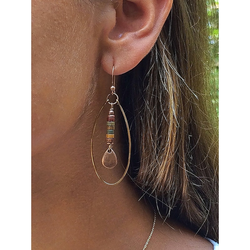 Women's boho chic earrings with colorful beads and gold oval design, Perfect for casual wear and summer festivals2