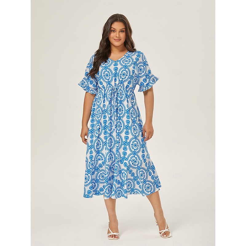 Resort-Style Blue Print Dress With a Fitted Waist3
