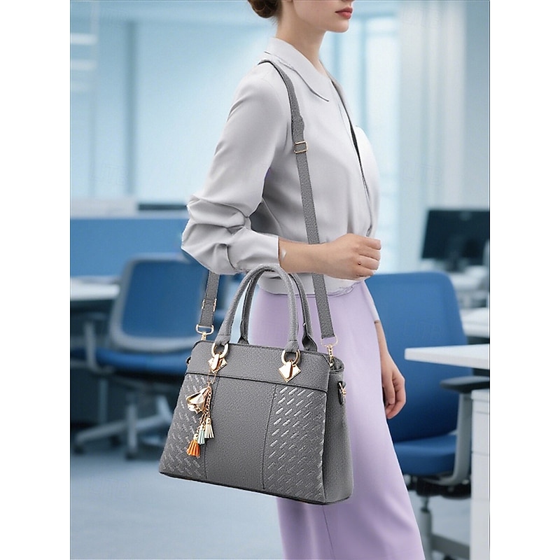 Women's Faux Leather Handbag with Tassel Charm and Textured Panels – Elegant Structured Shoulder Tote Bag for Office Work and Business Travel2