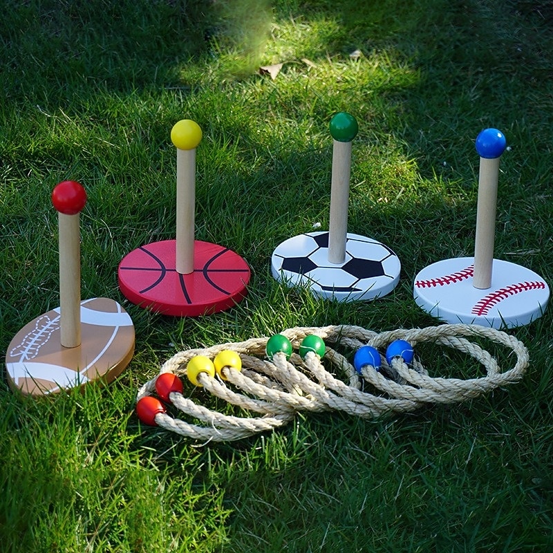 Outdoor Sports-Themed Rope Ring Toss Game with Wooden Stands and Colorful Balls - Ideal for Sensory Play and Motor Skills Development Grass Play Area Outdoor Play Equipment  Colorful Game Setup