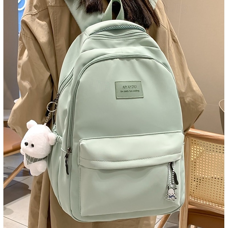Women's Light Green School Backpack with Cute Plush Bear Keychain, Large Capacity Multi-Pocket Waterproof Bookbag for Teen Girls, College, and Daily Use