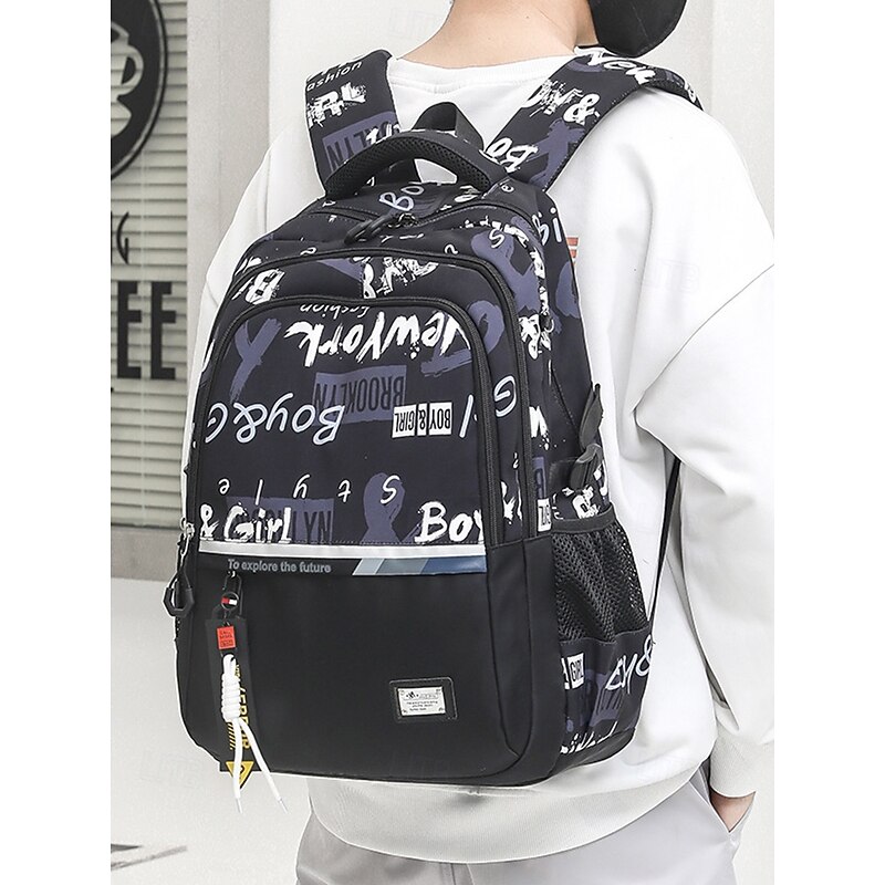 Waterproof Graffiti Print School Backpack for Teens – Large Capacity Black Bookbag with Padded Laptop Compartment, Stylish Travel Bag for Boys and Girls2