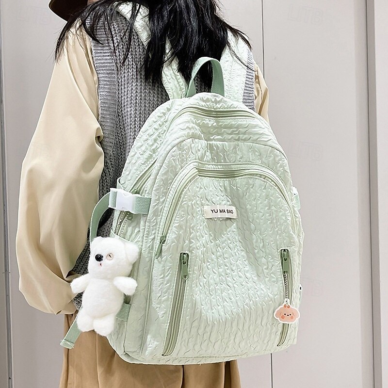 Women's Light Green Textured School Backpack with Cute Teddy Bear Keychain, Large Capacity Lightweight Bookbag for Teen Girls, College, and Casual Daily Use
