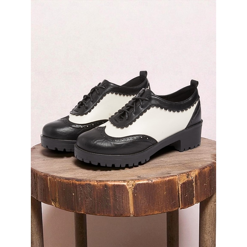Women's 1950s Vintage Black and White Oxford Brogue Shoes with Lace-Up Design and Low Block Heel - Retro Oktoberfest Footwear for Casual Wear, Work and Cosplay Outfits