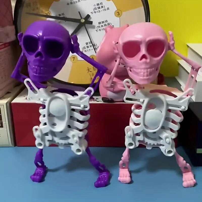 2 Pack Halloween Dancing and Swinging 3D Skull Toy – Wind Up Spring Skull Figurines for Desk Decoration, Stress Relief and Halloween Party Fun3