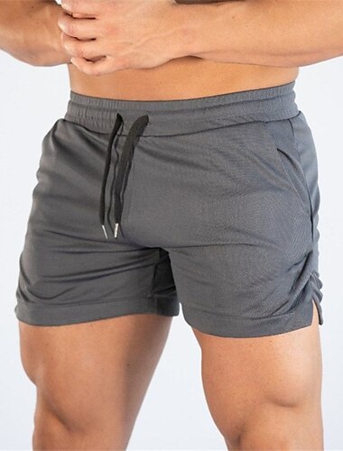 Per uomo Shorts sportivi Pantaloncini da corsa Shorts da palestra Coulisse Tasche Laterali Spacco Tinta unita Traspirante Asciugatura Rapida All'aperto Sportivo Spiaggia Casual Pantaloncini Nero