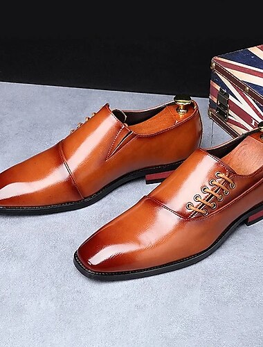  klassische Herrenschuhe aus braunem Leder – ideal für formelle Veranstaltungen und Geschäftstreffen