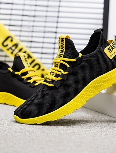  baskets de sport noires et jaunes pour hommes avec maille respirante et design léger pour le sport et les vêtements décontractés