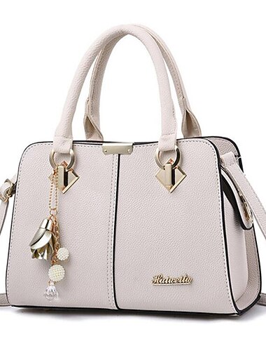  elegancka damska niebieska torebka z odpinanym paskiem i stylowym ozdobnym charmsem - idealna do biura i na co dzień