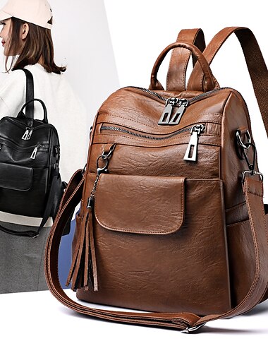  Sac à dos vintage en similicuir pour femme avec pompon et bandoulière convertible – sac à bandoulière antivol élégant pour les voyages, le travail ou un usage quotidien