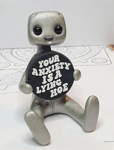  klein robotfiguurtje met slogan - je angst is een liggende robot, inspirerende schattige leuke bureaudecoraties