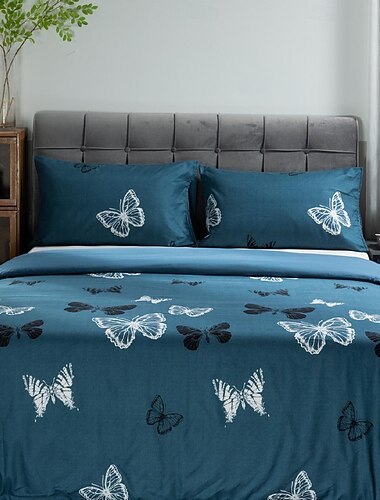  självlysande påslakanset med fjärilstryck - glöd-i-mörkret-design - inkluderar påslakan och örngott - mjukt och bekvämt tyg - perfekt för en magisk sovrumsinredning - lätt att rengöra och underhålla