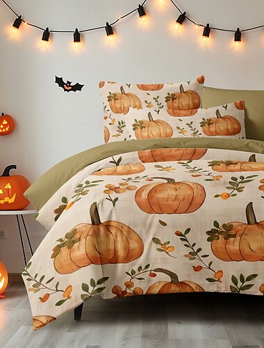  ハロウィーンのカボチャの掛け布団カバーセット - お祝い気分で遊び心のあるカボチャのデザイン - 掛け布団カバーと枕カバー付き - 柔らかくて心地よい生地 - 寝室の装飾に季節感を加えるのに最適です。