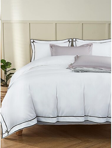  Juego de cama con funda nórdica de 4 piezas, tejido 100% algodón orgánico suave y transpirable, incluye funda nórdica y fundas de almohada para un sueño confortable.