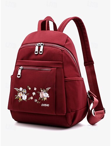 女性用花柄刺繍バックパック - 複数のポケットが付いたカジュアルなキャンバスデザインで、旅行や日常使いに最適です。