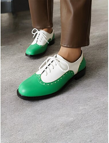 dámské černobílé oxfordky s brogue detaily – klasická dvoubarevná společenská obuv