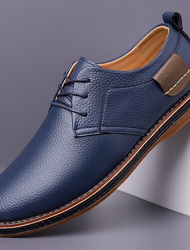  férfi alkalmi műbőr oxford cipő sötétkék színben, fűzős kialakítással, kényelmes és stílusos a mindennapi viselethez