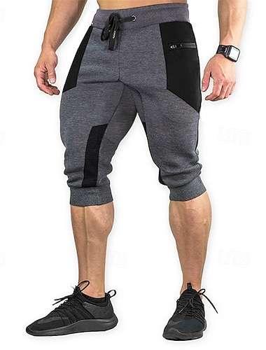  Miesten Hiki shortsit capri-shortsit Juoksuhousut Urheilushortsit Tasku Kurenauha Joustava vyötärö Väripalikka Mukavuus Hengittävä Vasikka-Length ulko- Urheilu Klassinen Vapaa-aika Musta Viini