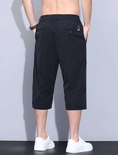  Herren Caprihose Shorts Schicke Shorts Freizeitshorts Tasche Elastischer Bund Gerader Schnitt Einfach Atmungsaktiv Feuchtigkeitsableitend Wadenlang Büro Geschäft Täglich Mode Streetwear Schwarz Blau