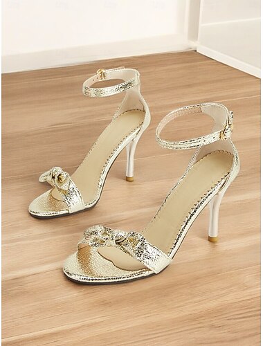  Tacones de aguja con tira en el tobillo dorada para mujer de los años 50: elegantes sandalias de tacón alto con punta abierta y detalle de lazo para bodas, fiestas y eventos nocturnos.