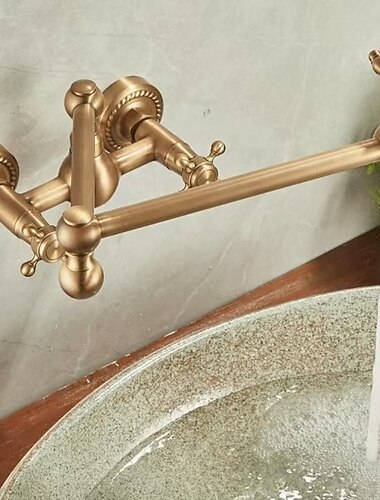  بالوعة الحمام الحنفية - سطح الجدار مطلي في وسط التعامل مع واحد اثنين من الثقوبBath Taps